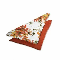 Wild Rose Napkin -Penguin Random House Sales Store Folded orange napkins 141019 v1 003d2f79 4fe8 41a0 bbe0 5899f83473f3