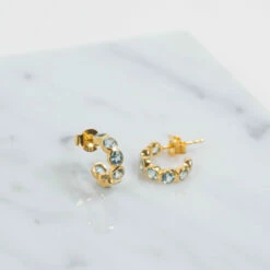 Ortigia Mini Blue Topaz & Gold Vermeil Hoop Earrings 5 Ortigia Mini Blue Topaz & Gold Vermeil Hoop Earrings -Penguin Random House Sales Store Ortigia Mini Blue Topaz Earrings